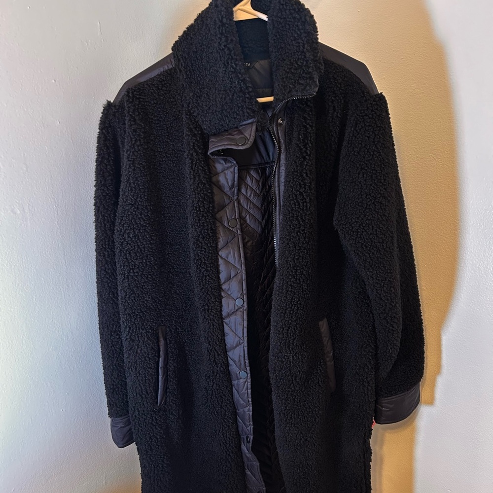 Athleta women’s mid length coat.